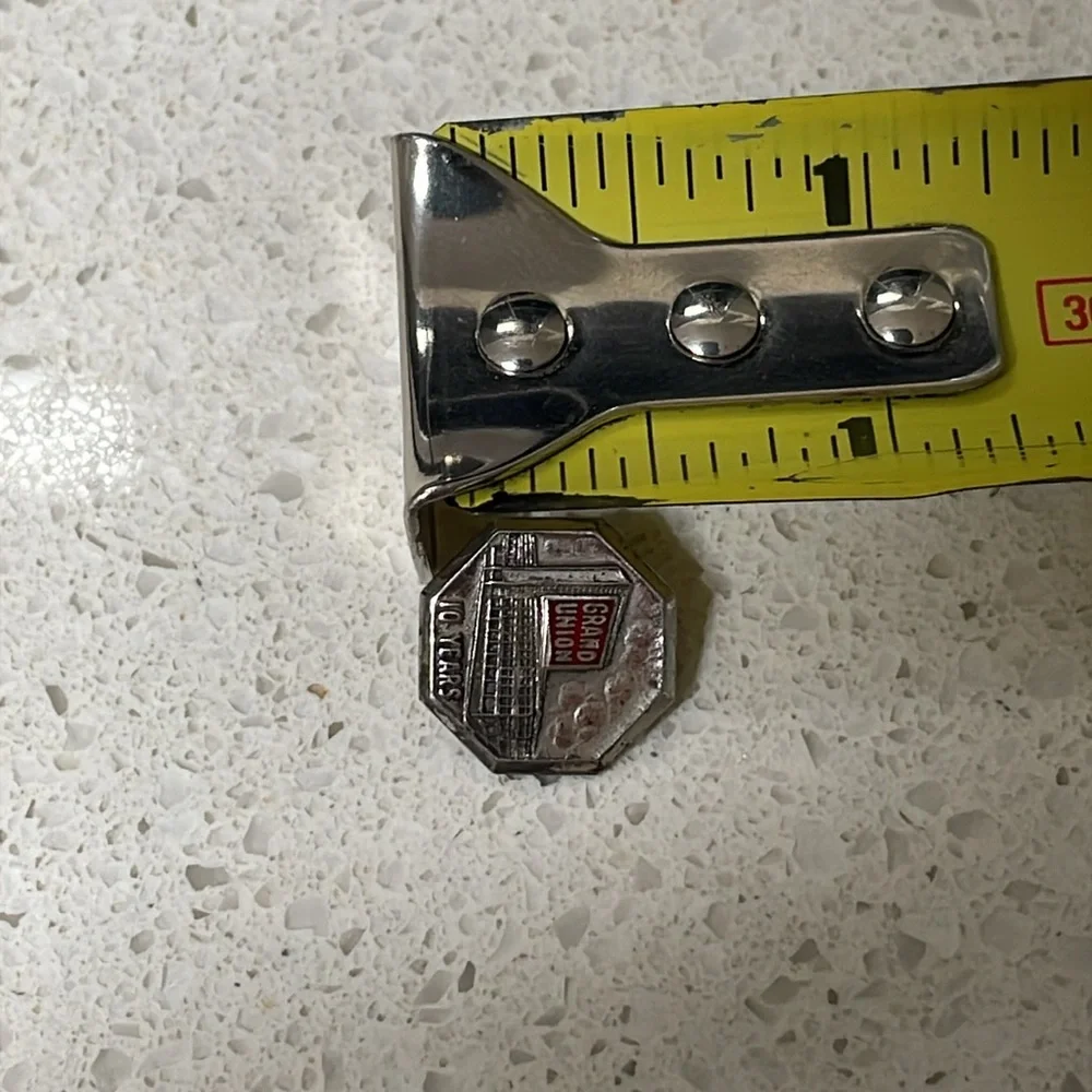 Vintage sterling silver Grand Union 10 year collectible lapel pin